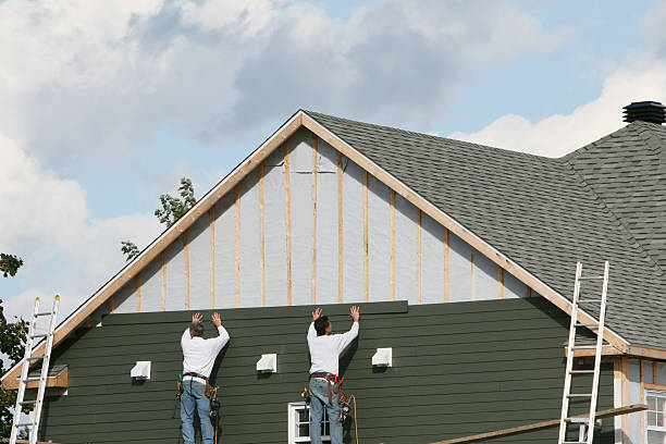Professional Siding Contractor technician working in Fletcher, NC